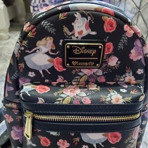 Loungefly Alice in Wonderland pack back.